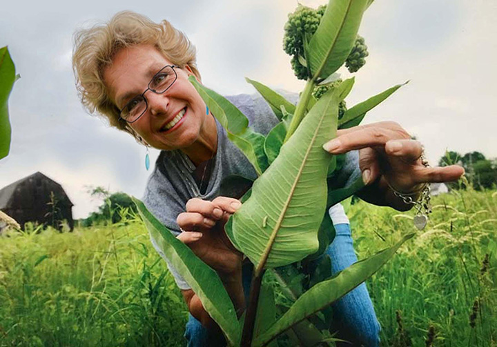 Lynn in a field with milkweed